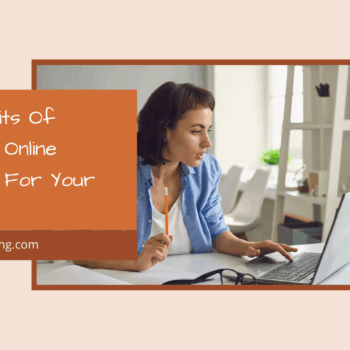 Woman making notes on laptop
